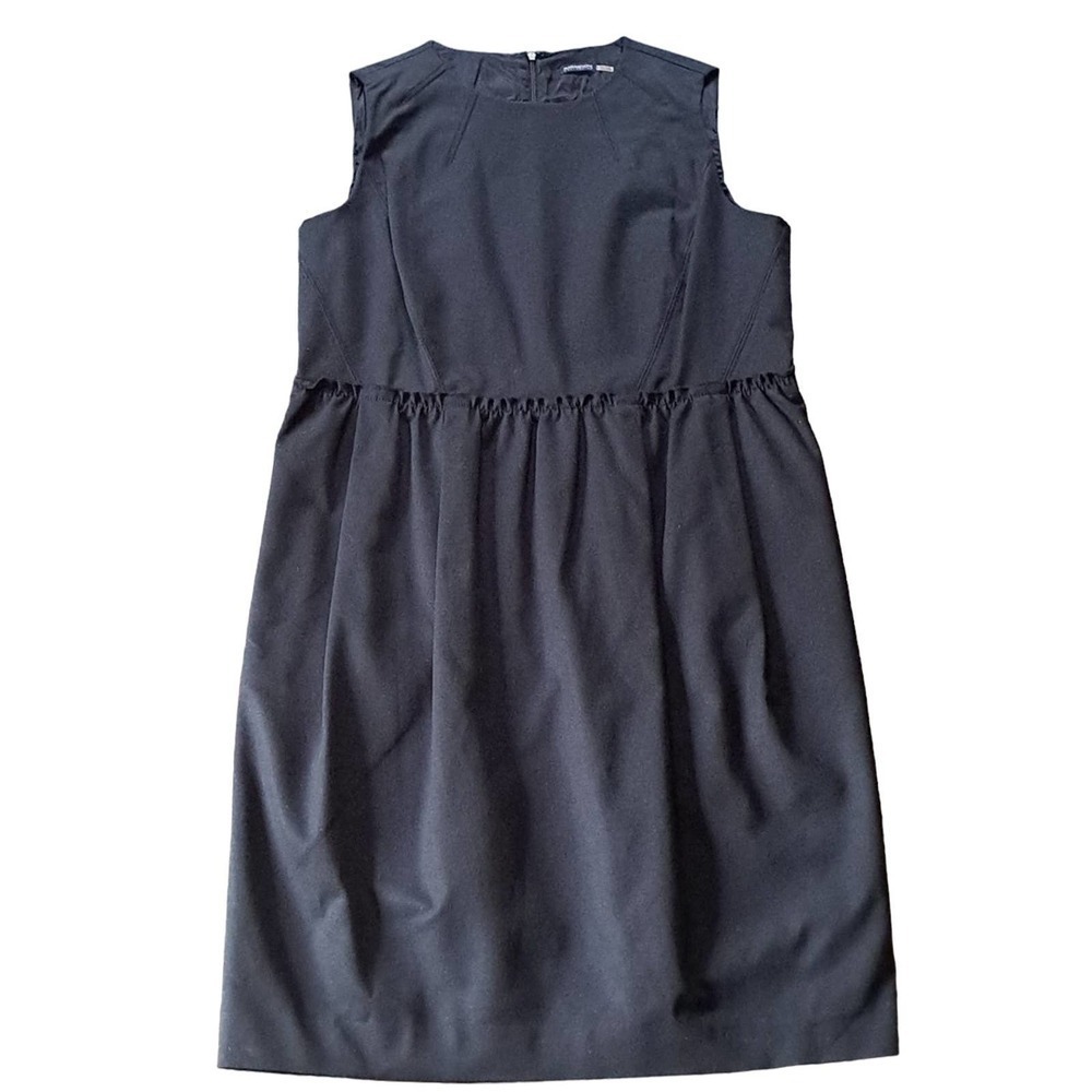 Magaschoni Collection black dress with pockets and zipper back. Size 16
